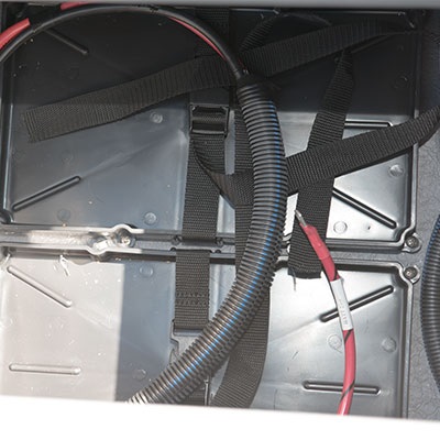 Trolling motor battery storage with optional bow trolling motor plug