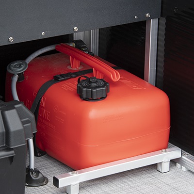 Portable gas tank and battery storage under the stern fishing station