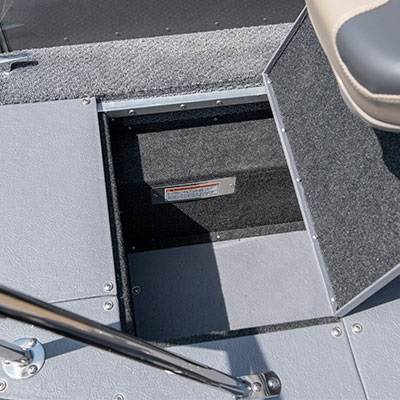 In-floor rear storage compartment